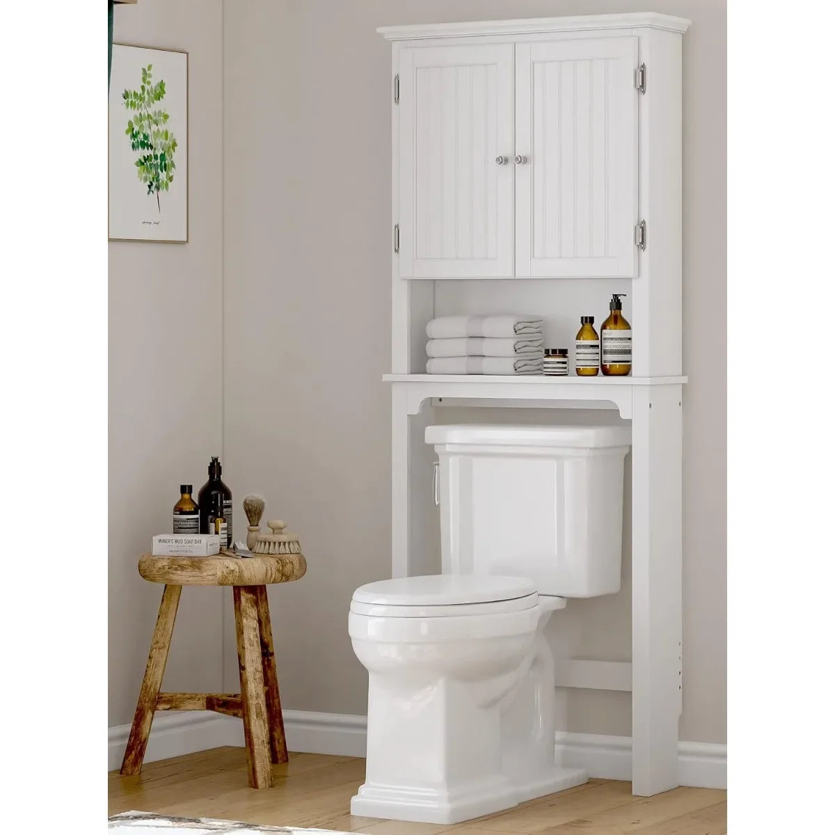 White Over-Toilet Storage Cabinet with Double Doors. Adjustable Shelf Organizer for Bathroom Space Saving.